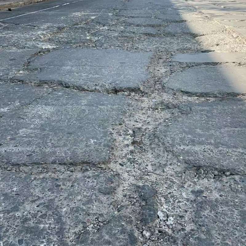 永福路面起砂露石子修补料